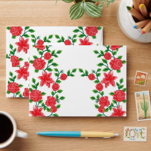a red rose pattern on a white background envelope