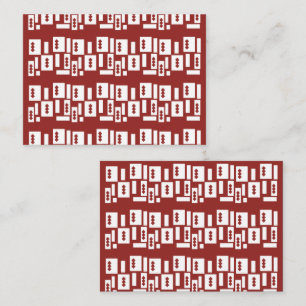 A red rug with a textured pattern is spread out on place card