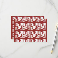 A red rug with a textured pattern is spread out on