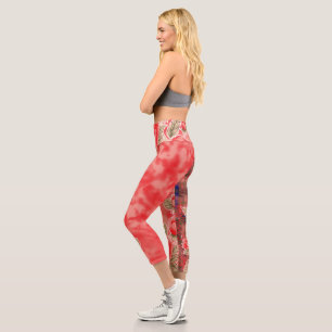 a red scarf with flowers on it capri leggings