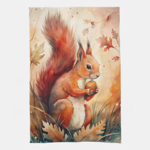 A Red Squirrel eating a nut Tea Towel