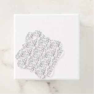 A refined black and white floral motif, highlighti favour tags