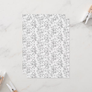 A refined black and white floral motif, highlighti invitation