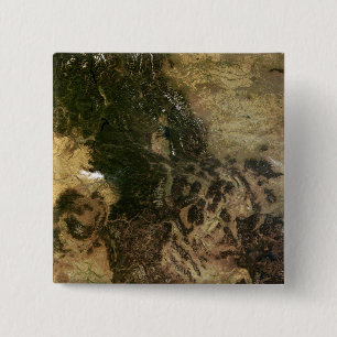 A relatively clear day 15 cm square badge