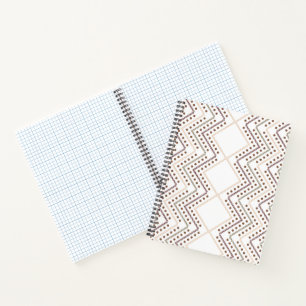 A repeating geometric pattern with diamond shapes notebook