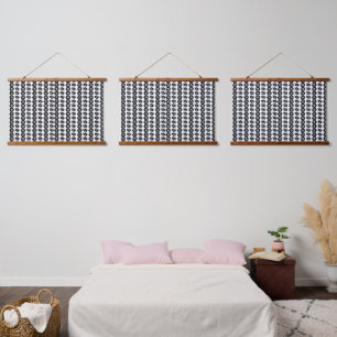 A repeating pattern of interconnected circles and hanging tapestry
