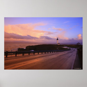A Road & A Lighthouse Along The Coast At Sunset Poster