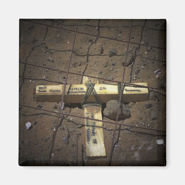 A road repair crew places a cross magnet (Front)