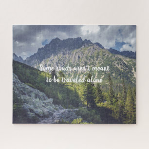 A rocky trail towards high mountain peaks jigsaw puzzle