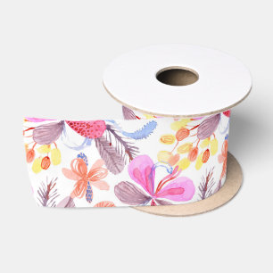A roll of decorative ribbon with a floral pattern satin ribbon