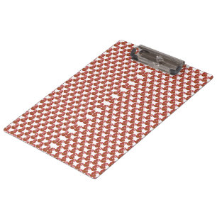 A rolled-up piece of wrapping paper with a festive clipboard