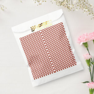 A rolled-up piece of wrapping paper with a festive favour bag