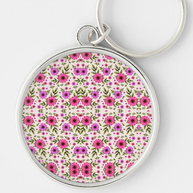 A round keychain featuring a colourful floral  (Front)