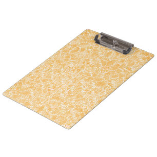 A round rug with a vibrant blend of yellow and ora clipboard