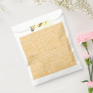 A round rug with a vibrant blend of yellow and ora favour bag