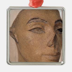 A royal head, possibly of Nefertiti, from Metal Ornament