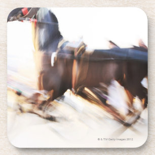 A running horse at a high speed is competing in coaster