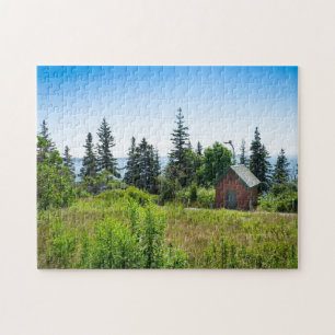 A rustic shed sits in a Maine meadow Jigsaw Puzzle