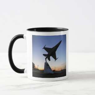 A scale model of an F-16 C Fighting Falcon Mug