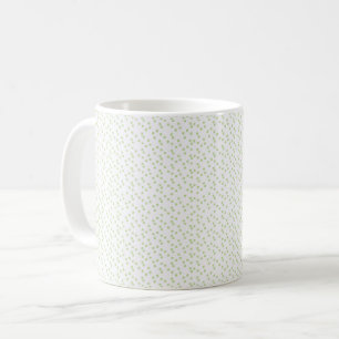 A scattering of pale green squares on white. coffee mug