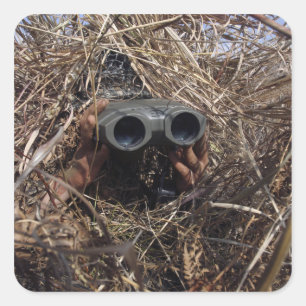 A scout observer practices observation techniqu square sticker