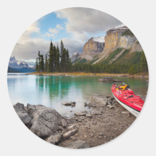A sea kayak ashore at Spirit Island Classic Round Sticker