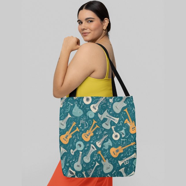 A seamless pattern featuring musical instruments tote bag (Creator Uploaded)