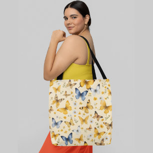 A seamless pattern of various butterflies flowers tote bag