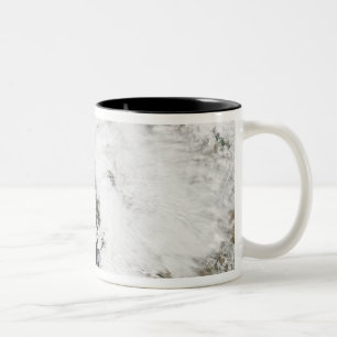 A series of strong storms with fierce winds Two-Tone coffee mug