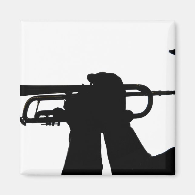 A service member plays a tune magnet (Front)