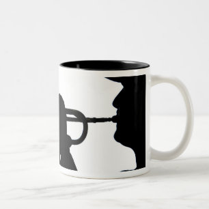 A service member plays a tune Two-Tone coffee mug