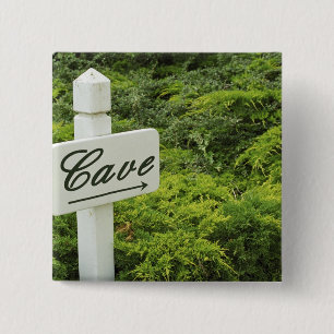 A sign pointing tho the wine cellar (Cave) in 15 Cm Square Badge