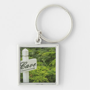 A sign pointing tho the wine cellar (Cave) in Key Ring