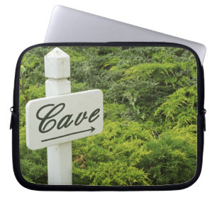 A sign pointing tho the wine cellar (Cave) in Laptop Sleeve