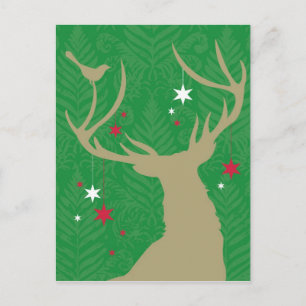 A silhouette of a deer with stars hanging from its postcard