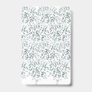 A silver drop splashes into a pool of white liquid ID badge