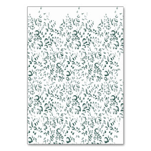 A silver drop splashes into a pool of white liquid table number