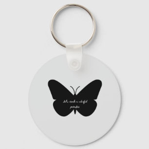 A simple quote in a simple butterfly key ring