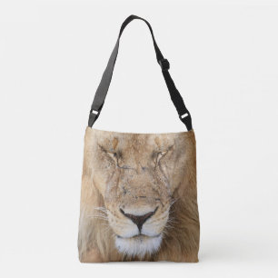 A single sleeping lion. Africa Serengeti Crossbody Bag