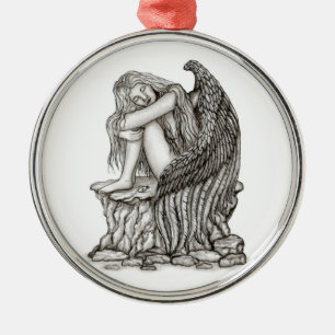 A sleeping Angel on the Stone Metal Ornament