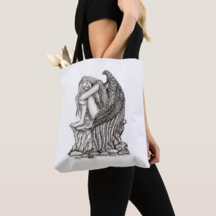 A sleeping Angel on the Stone Tote Bag