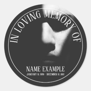 A sleeping face in half shadow classic round sticker