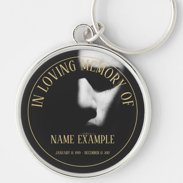 A sleeping face in half shadow keychain (Front)