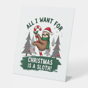 A Sloth For Christmas. Cute, Christmas Sloth With Pedestal Sign