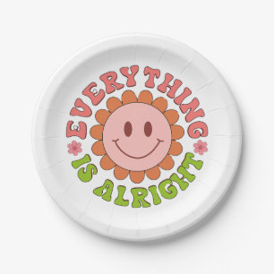 A smiling face with a flower and the words everyth paper plate