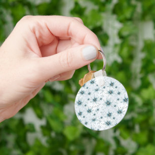 A snowflake winter event decor key ring
