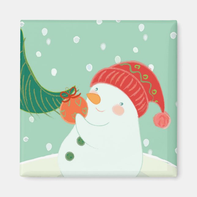 A snowman hanging an ornament on a tree magnet (Front)
