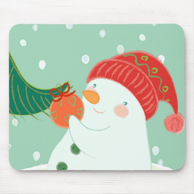 A snowman hanging an ornament on a tree mouse pad (Front)