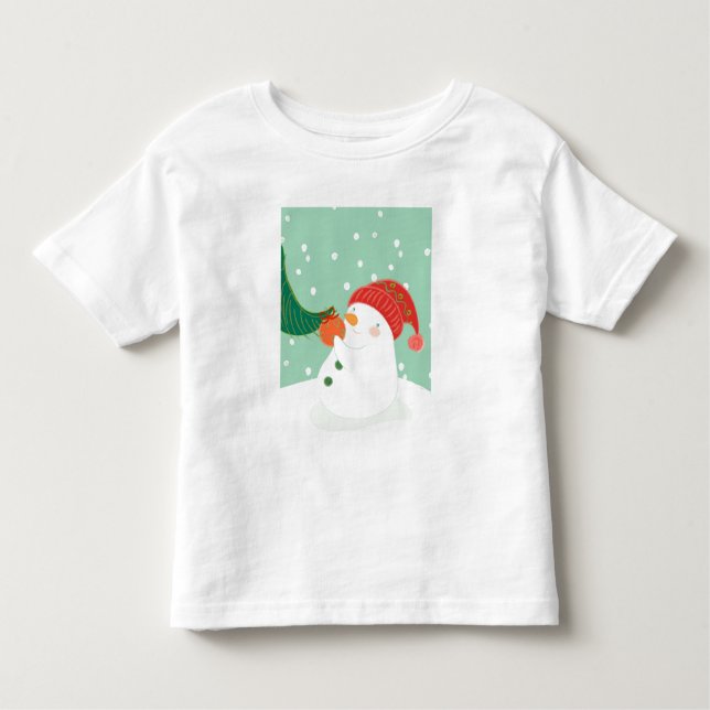 A snowman hanging an ornament on a tree toddler T-Shirt (Front)