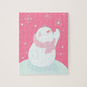 A snowman reaching for a falling snowflake jigsaw puzzle